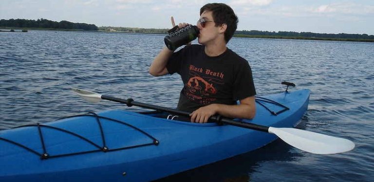 Drinking on a kayak